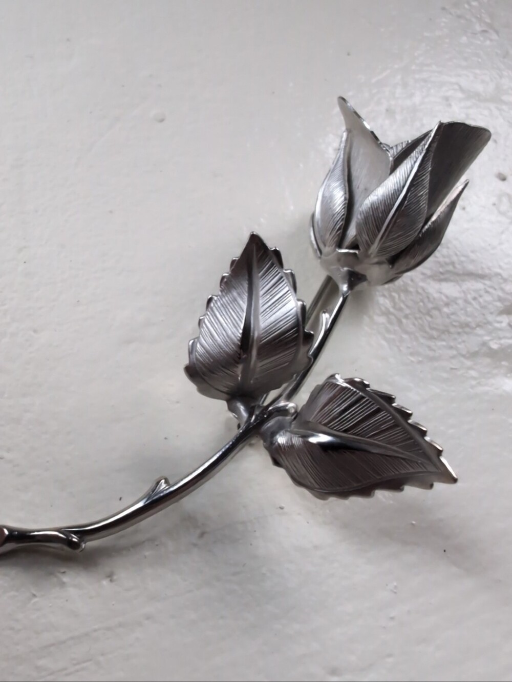 Vintage silver tone rose with stem brooch